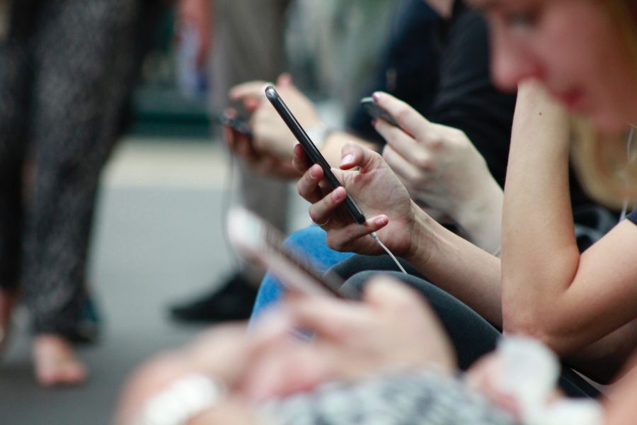 Person holding black smartphone